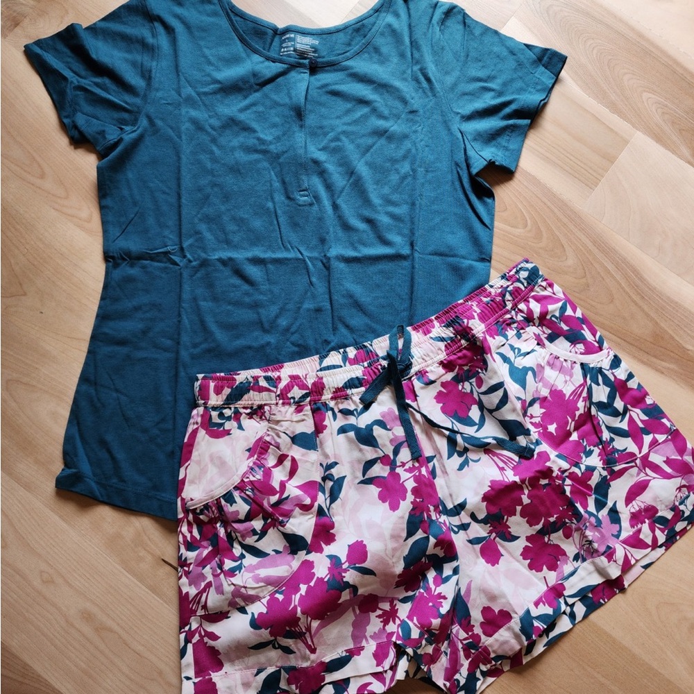Short set, fuschia flowers with teal colored leaves, teal colored top.